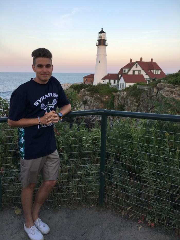 Dave at Portland Head Light lighthouse on the Maine coast at sunset